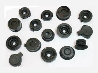 Moulded rubber dust caps